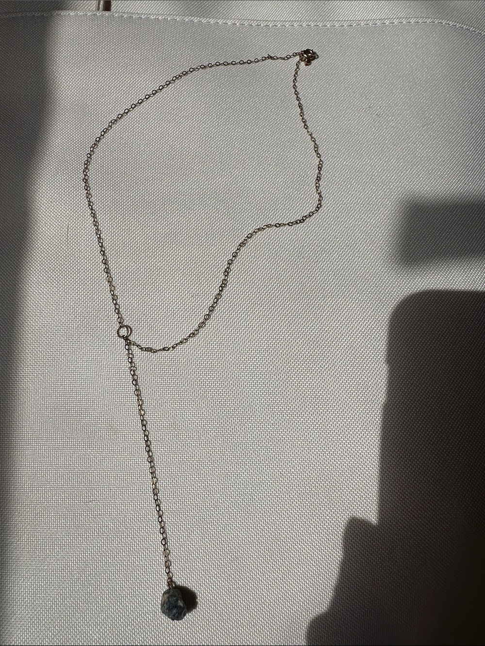 Delicate Gold Lariat Necklace with gray Stone Pendant